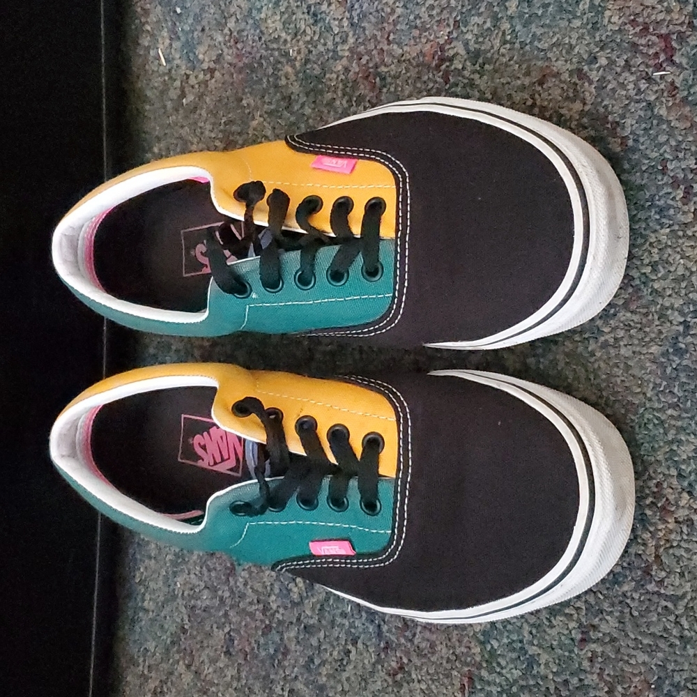 Vans, 11 men, and are black, yellow, blue, and green